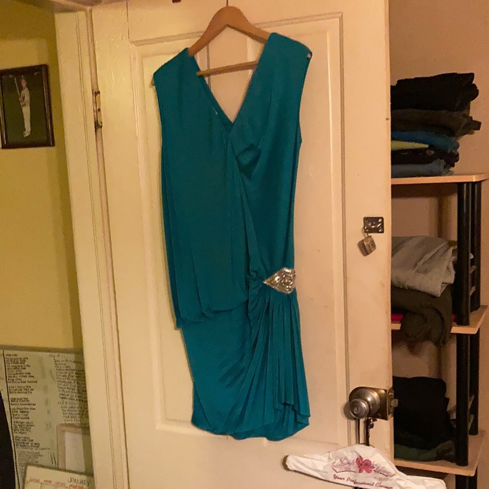 Turquoise cocktail dress with silver sequins design